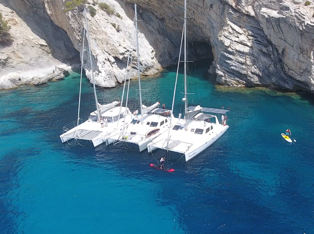 3 catamarans together in Cala d'en Tio in Majorca