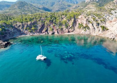 blue bay with single catamaran